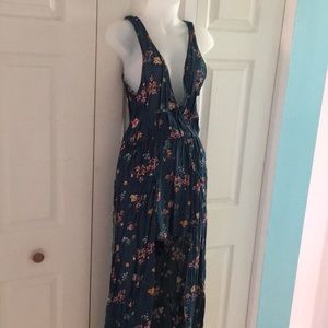 Cute spring/summer high low shorts romper.